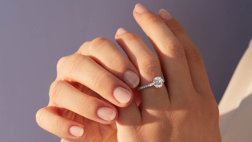 How much should i save for an engagement ring sales